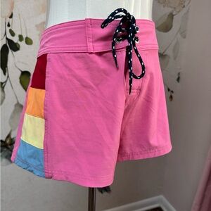 Stylish Pink Athletic Shorts with Rainbow Detail